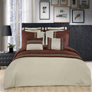 Neatly made bed with brown and beige comforter and pillows in a bedroom setting.