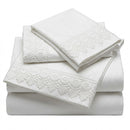 White embroidered bedding set on a white background